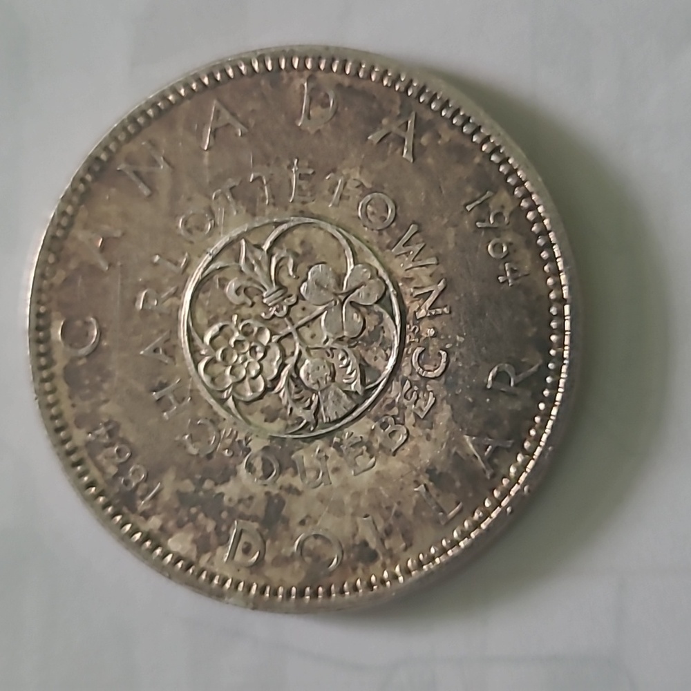 Antique Coin with Floral Design